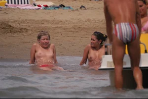 Girls on a nude beach in Bibione, Italy