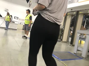 Sexy Amazon employee in leggings with a nice ass