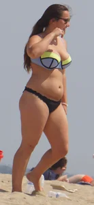 Thick girl on the beach in a bikini