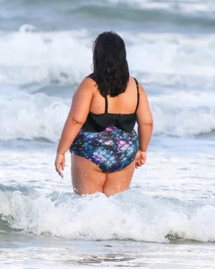 Extra thick girl at the beach in a bikini