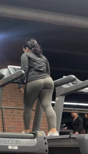 Sexy Latina with thick thighs in gray tight leggings on the treadmill