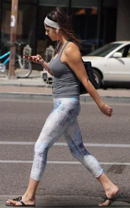Flat ass brunette walking in leggings with big boobs