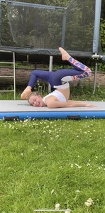 Teen gymnast working out in the backyard