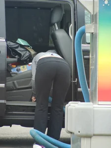 Girls cleaning their cars in jeans and pants