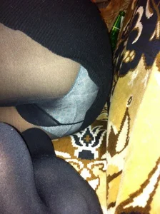 Booty And Feet in Black Pantyhose - Girl Curled Up on a Couch Flashing Her Panties Home Creepshot