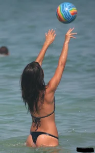 A bunch of sexy beach voyeur babes in bikinis, thongs and topless