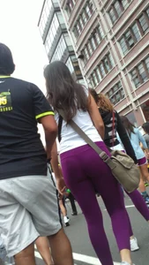 Girl out with a friend in purple leggings with a nice ass and slight vtl