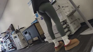 Green Lululemons Bent Over at Fedex