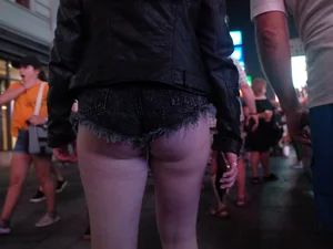 Girl in NYC showing her ass cheeks in denim shorts