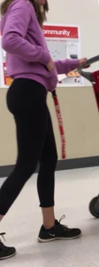 Teen in leggings at the store, closeup creepshot of her ass and legs
