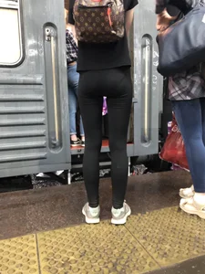 Teen Girl in Tights And Sneakers Standing on the Train Platform VPL Photos