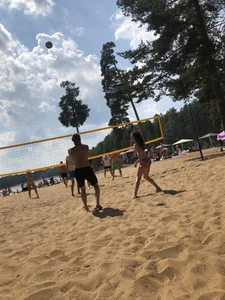 Swimsuit Candid Girl Playing Volleyball at a Beach Gallery