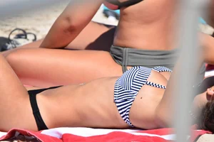 Sexy group of girls on the beach in various sizes
