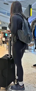 Cute girl with glasses in leggings