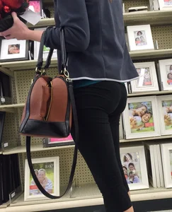 Sexy lady shopping at Walmart in leggings
