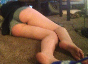 Barefoot Girl in Mini Shorts Lying on the Floor Home Creepshot
