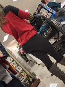 Brunette with a tight butt, boots, and a VPL