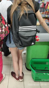 Skinny Pale Legs in Denim Shorts Supermarket Candid Girl