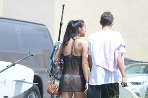 Sexy Florida girl showing her white thong bikini under see through dress