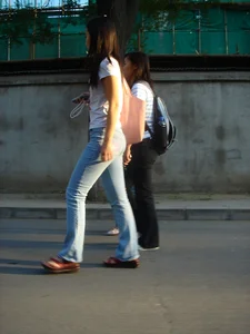Cute Asian girl with a nice booty in tight jeans