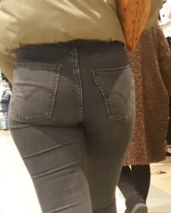Hot girl with a worked out ass in tight grey jeans
