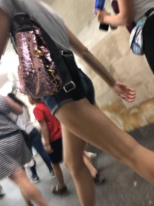Tall Candid Teen Girl in Denim Shorts And Sandals Sitting in the Subway Train, Then Walking Down the Station