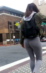 College girl in striped leggings walking with nice ass