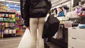 Very tight ass of slim T in grey leggings
