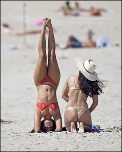 Sexy girls at the beach in thongs and bikinis with nice asses