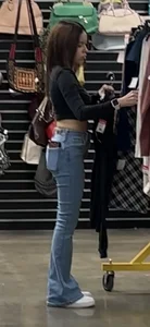 Petite Asian ho showing off tramp stamp & bubble butt