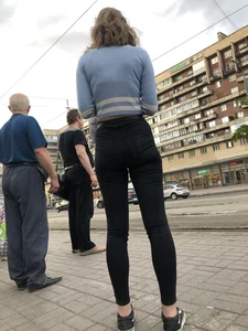 Skinny Girl in Tight Black Jeans on the Bus Stop Candid Photos