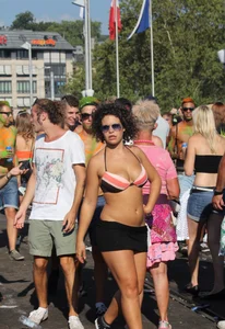 Boobs out in public in either bikini tops or bras