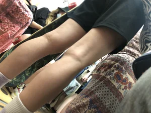 Candid Slim Legs in Shorts And Booty Closeup in the Subway Train