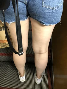 Hot Booty In Blue Jean Shorts And Chunky Legs Creepshots Gallery on a Subway Escalator