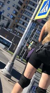 Fit Girl in Spandex Shorts And Knee Pads on Roller Blades Street Creepshots