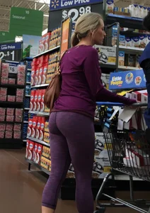 Sexy blonde shopping at Walmart in purple leggings with some vpl