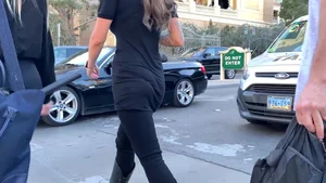 Hottie in spandex booty shorts with a nice ass showing her cheeks and slight camel toe