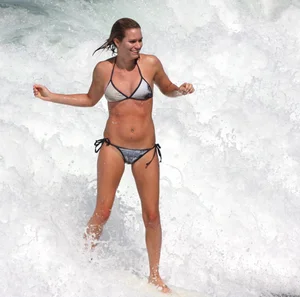 Candid surfer babes on the beach and in bikinis