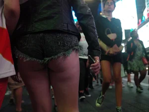Girl in NYC showing her ass cheeks in denim shorts