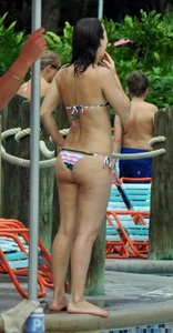 Milf in a bikini with a big booty at the pool