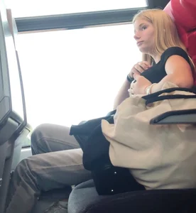 Hot busty blonde on train