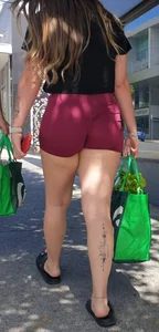 PAWG in incredible lighting and tiny tight shorts. Visible thong line and feet. Thick thighs and calf tatts. (OC)