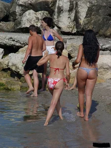 Beach voyeur girls in bikinis, thongs and topless