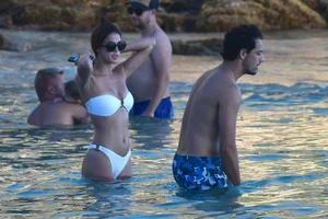 Iris Mittenaere in a white thong bikini on the beach in St Martin