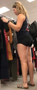 Tall thicc curly blonde in tight black shorts 0927