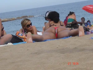 Tanned Girl Lying on a Beach With Spread Legs Creepshot