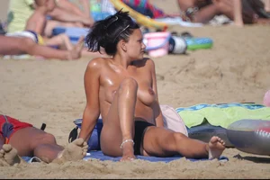 Girls on a nude beach in Bibione, Italy