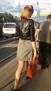 Girl with Skinny Legs Walking on City Street Candid