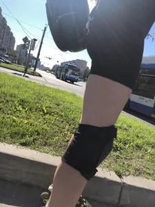 Fit Girl in Spandex Shorts And Knee Pads on Roller Blades Street Creepshots