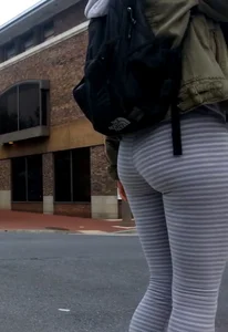 College girl in striped leggings walking with nice ass